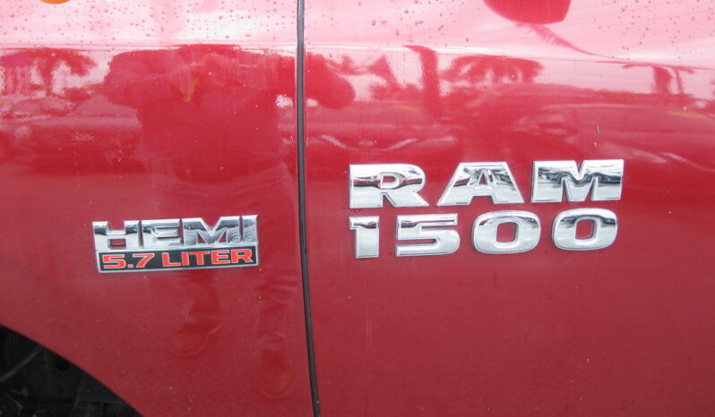 
								2014 Ram 1500 Quad Cab 140.5″ SLT full									